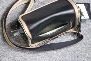 Men's casual crossbody bag with striped strap and zipper pocket, stylish urban daily shoulder bag.