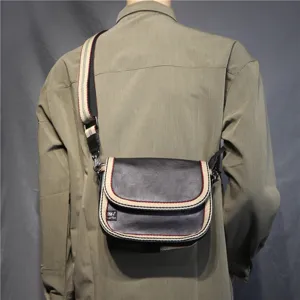 Men's casual crossbody shoulder bag with stylish striped strap and flap design for daily use.
