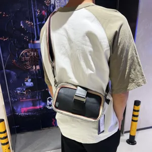 Trendy men's crossbody bag with retro striped border and metal buckle, ideal for outdoor use.