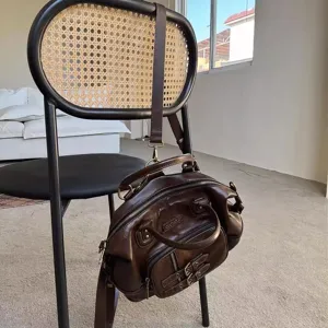 Vintage oil wax leather motorcycle style tote bag, versatile 3-way carry handbag and backpack.