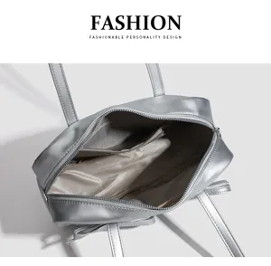 Silver bowling shoulder bag detail view, stylish PU leather handbag for women fashion wear.