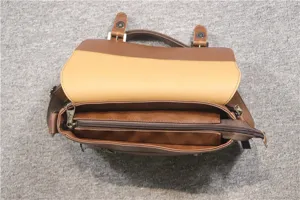 Brown vintage messenger bag interior detail showing durable zipper and lining construction.