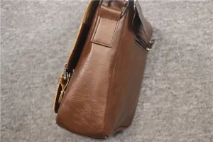 Detailed side view of a stylish brown leather bag showing fine texture and craftsmanship.