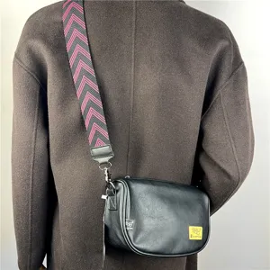 Casual crossbody bag for women and men, featuring a stylish wide strap and compact design.