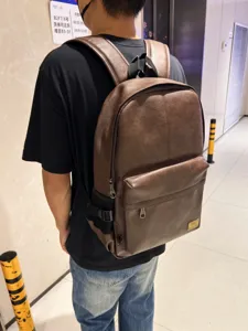 Zaino vintage in pelle marrone da uomo, borsa casual per computer e scuola.
