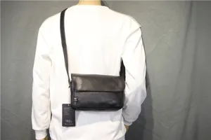 Black minimalist flap crossbody bag for men, vintage Japanese style casual shoulder bag daily use.