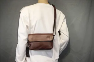 Vintage brown leather crossbody bag for men and women, minimalist retro shoulder messenger bag.