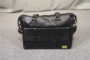 Men's black leather business briefcase detail view, professional laptop messenger bag.