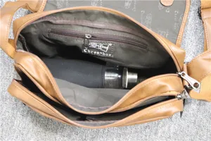 Detail view of men's casual soft leather messenger bag interior structure and capacity.