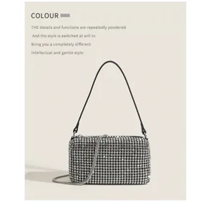Detailed view of the sparkling rhinestone evening bag with elegant crystal mesh and slim strap.