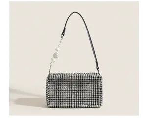 Rhinestone evening shoulder bag with pearl charm detail, sparkling crystal purse for party.