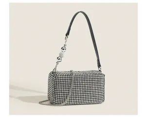 Sparkling rhinestone detail of this elegant evening bag, showing exquisite craftsmanship.
