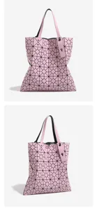 Close-up details of the pink geometric lattice tote bag showing unique panel design.