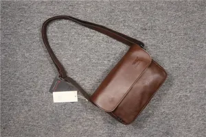 Brown retro minimalist flap shoulder bag for men and women, casual daily leather messenger bag.