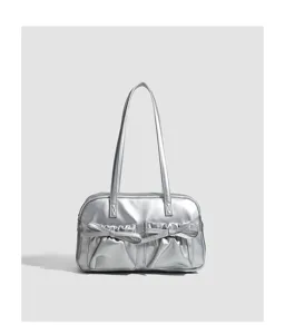 Silver metallic shoulder bag for women, stylish bowling bag with cute bow front pockets.