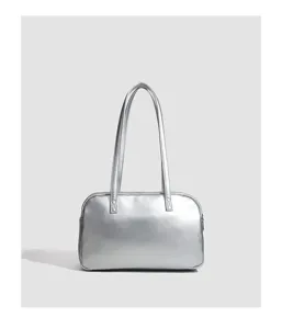 Silver metallic shoulder bag, trendy underarm bowling handbag with dual straps for women.