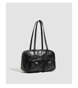 Stylish black shoulder bag for women, PU leather bowling bag with cute front bow pockets.