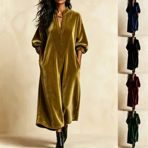 European style velvet long dress with v-neck, lantern sleeves, and pockets. Elegant look.