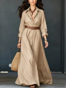 Featuring a long sleeve linen shirt dress design with button details and a stylish brown belt.