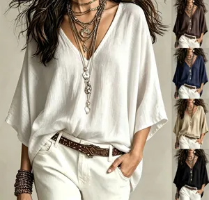 Close-up details of the casual V-neck three-quarter sleeve loose cotton linen blouse.