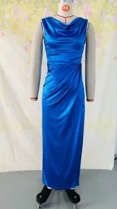 Detail view of a blue sleeveless split high-waist slim banquet evening dress for summer.