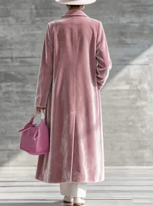 Women's pink velvet long coat, elegant lapel design, stylish winter over-knee outerwear detail.