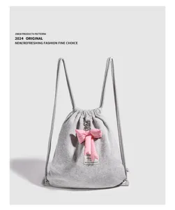Sac à dos cordon gris pour femme, sac d'école minimaliste décontracté avec joli nœud rose.