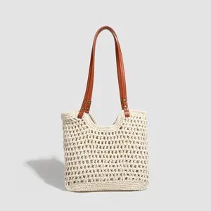 Casual woven tote bag for women, large capacity straw beach shoulder bag with leather handles.