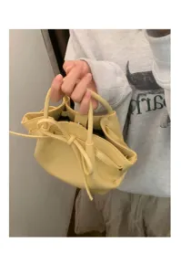 Piccola borsa a secchiello gialla con manico coulisse e fiocco moda donna borsetta