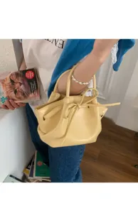Borsa a secchiello gialla da donna, elegante borsa in ecopelle con grazioso fiocco per uso quotidiano.