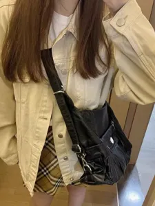 Retro motorcycle slouchy shoulder bag for women, soft PU leather tote bag with adjustable strap.