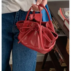 Sac seau rouge brillant pour femme, joli nœud, sac à main tendance de mode coréenne.