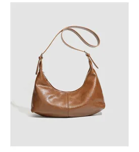 Modische braune Leder Baguette Umhängetasche für Damen, retro schicke Achseltasche.