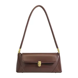 Retro brown leather baguette shoulder bag for women, chic vintage underarm purse with lock.
