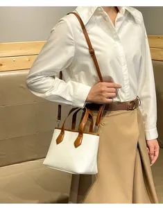 Commuter versatile handbag bucket bag, stylish litchi grain leather shoulder messenger bag.
