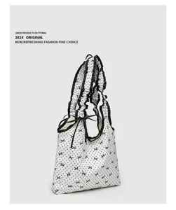 Korean style canvas shoulder bag with black polka dots, cute bow and ruffled straps.