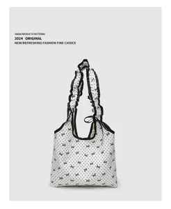 Sweet polka dot canvas shoulder bag with ruffle straps, casual cute tote for daily commute.