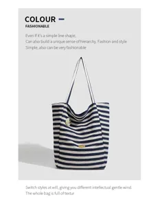 Striped canvas tote bag detail view, casual large capacity shoulder bag for women.