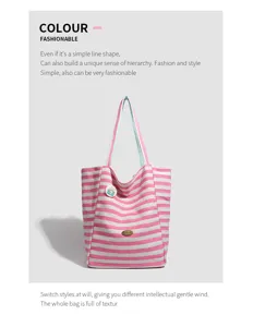 Pink and white striped canvas tote bag detail, featuring durable shoulder straps and cute badge.