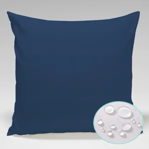Outdoor waterproof throw pillow cover in solid dark blue with water repellent detail insert.