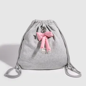 Sac à Dos Cordon Polyester Décontracté pour Femmes Minimaliste Niche Mignon Nœud Cartable d'Étudiant Léger Sac de Jour