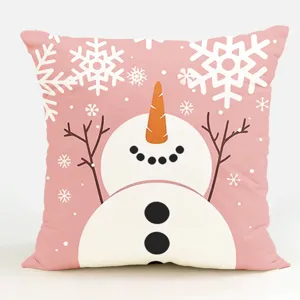Pink Christmas snowman cushion cover detail showcasing cute winter snowflake pattern texture.