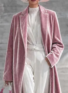 Pink velvet long coat detail shot, elegant lapel over-the-knee autumn winter fashion outerwear.
