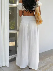 Casual resort style loose wide-leg women pants in white, perfect for summer vacation.