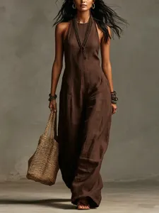 Detailed view of the elegant halter neckline and premium linen-texture fabric on this jumpsuit.