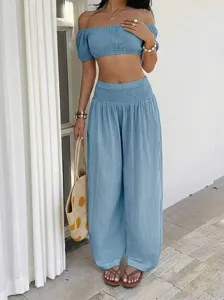 Summer vacation style women casual two piece set off shoulder top and wide leg pants loose fit.
