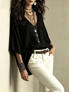 Vue détaillée d'un t-shirt femme automne ample tendance uni col V casual confortable.