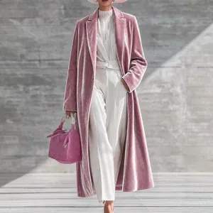 Chic women's pink velvet long coat, elegant lapel design, autumn winter fashion outerwear.