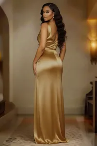 Elegant gold satin evening dress detail, sleeveless slim fit silhouette showcasing premium texture.