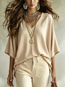 Casual V-neck half sleeve loose linen blend women top with layered necklaces and chic style.